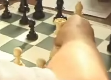 Kid playing chess
